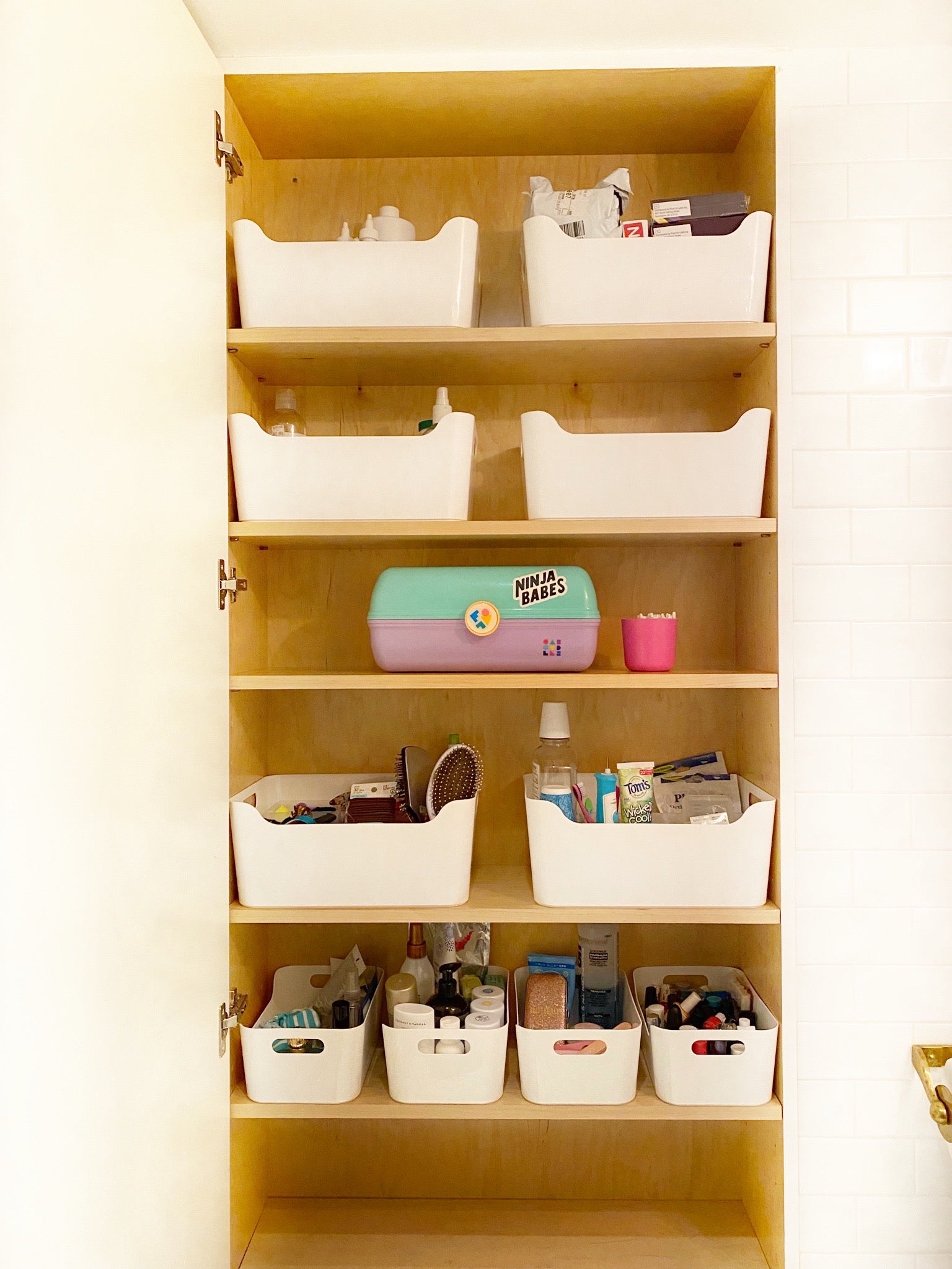 Bathroom Closet Organization | thetidyspot.com