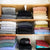 Folded Clothing Stacked on Shelves with Clear Shelf Dividers | thetidyspot.com