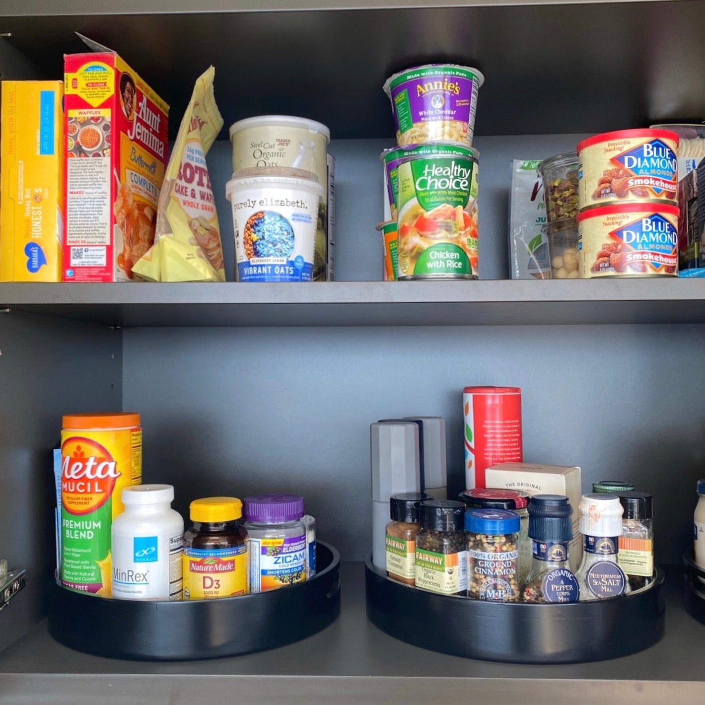 Kitchen Cabinet Pantry Organization with Black Lazy Susan / Turntables | thetidyspot.com